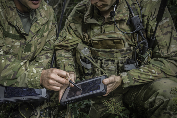 NZDF personnel looking at a tablet